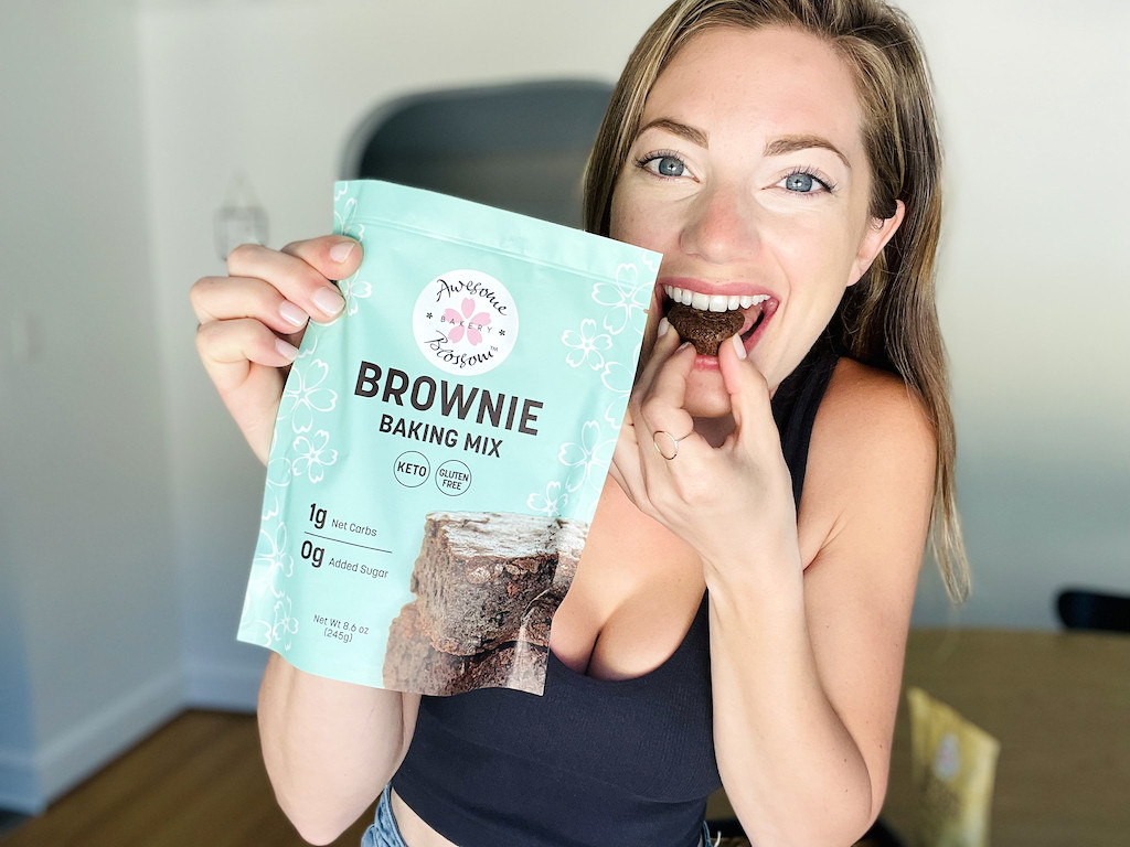 woman eating mini keto brownie 