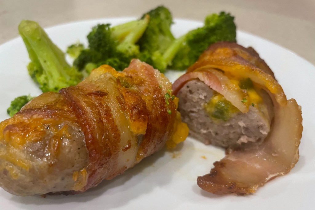 bacon wrapped sausage plated 