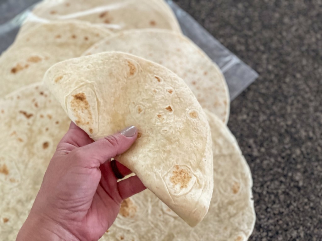 hand holding a hero tortilla 