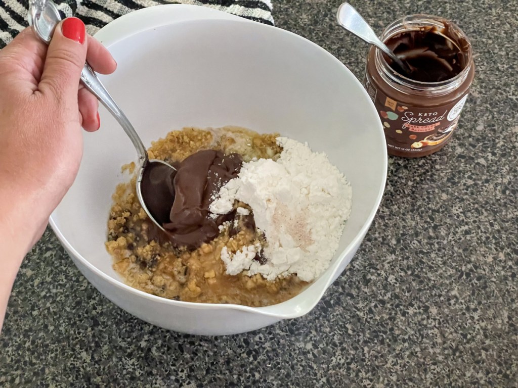 mixing bowl with no bake cookie bar ingredients 