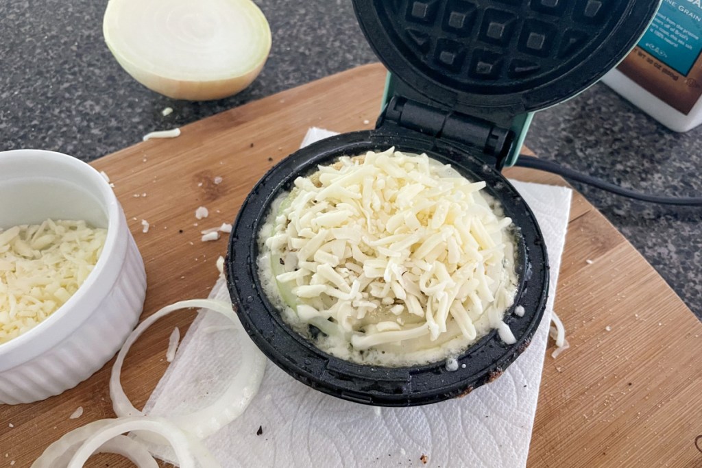 cheese and onions in mini waffle maker