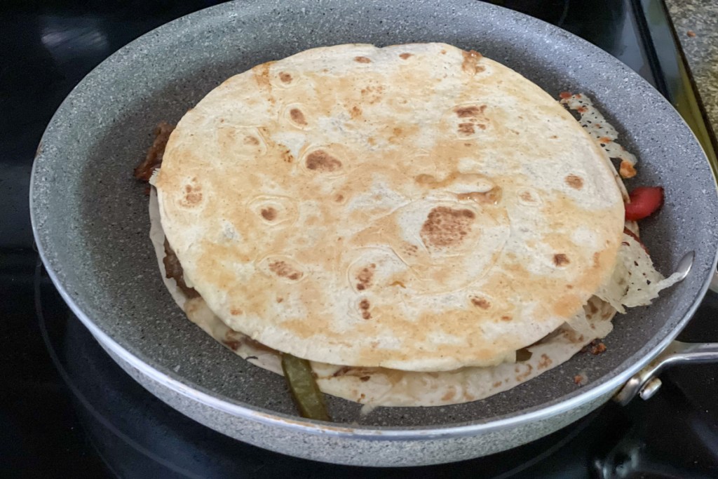 steak quesadilla in a skillet 