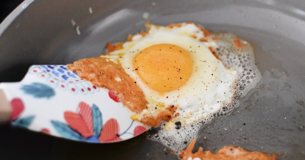 frying a keto cheese egg on a skillet