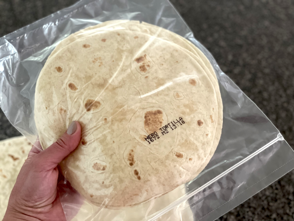 hand holding a package of no carb tortillas