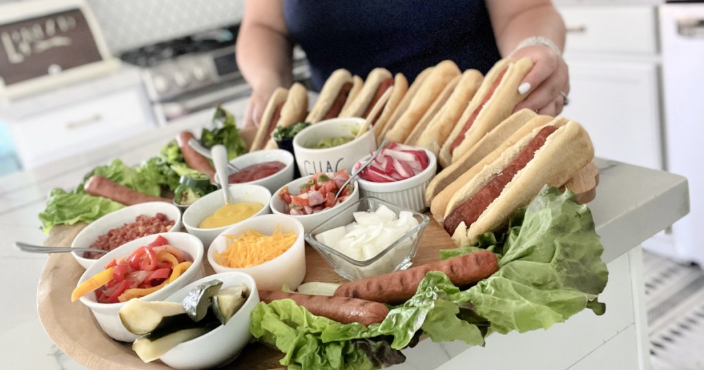 woman building a hot dog board