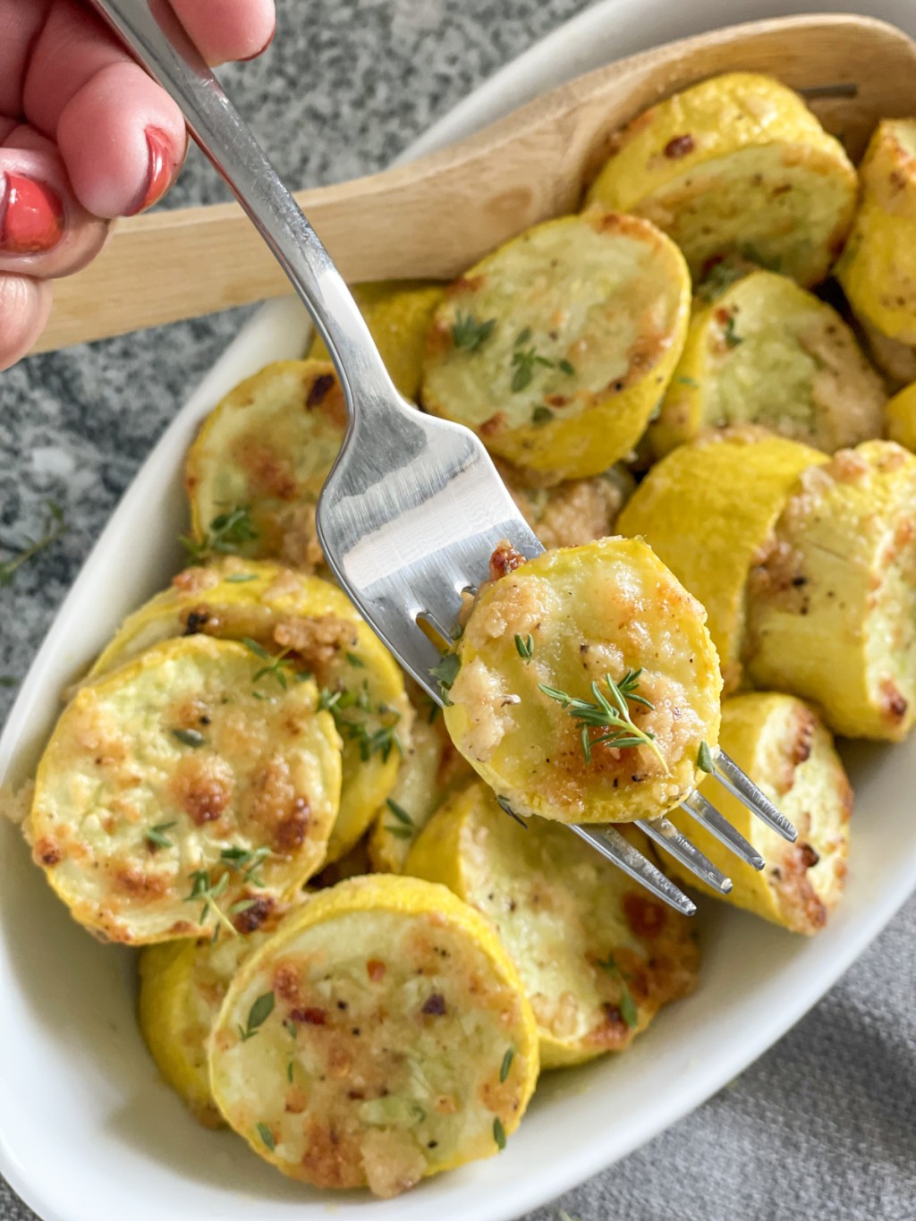 fork bite of Garlic roasted yellow squash