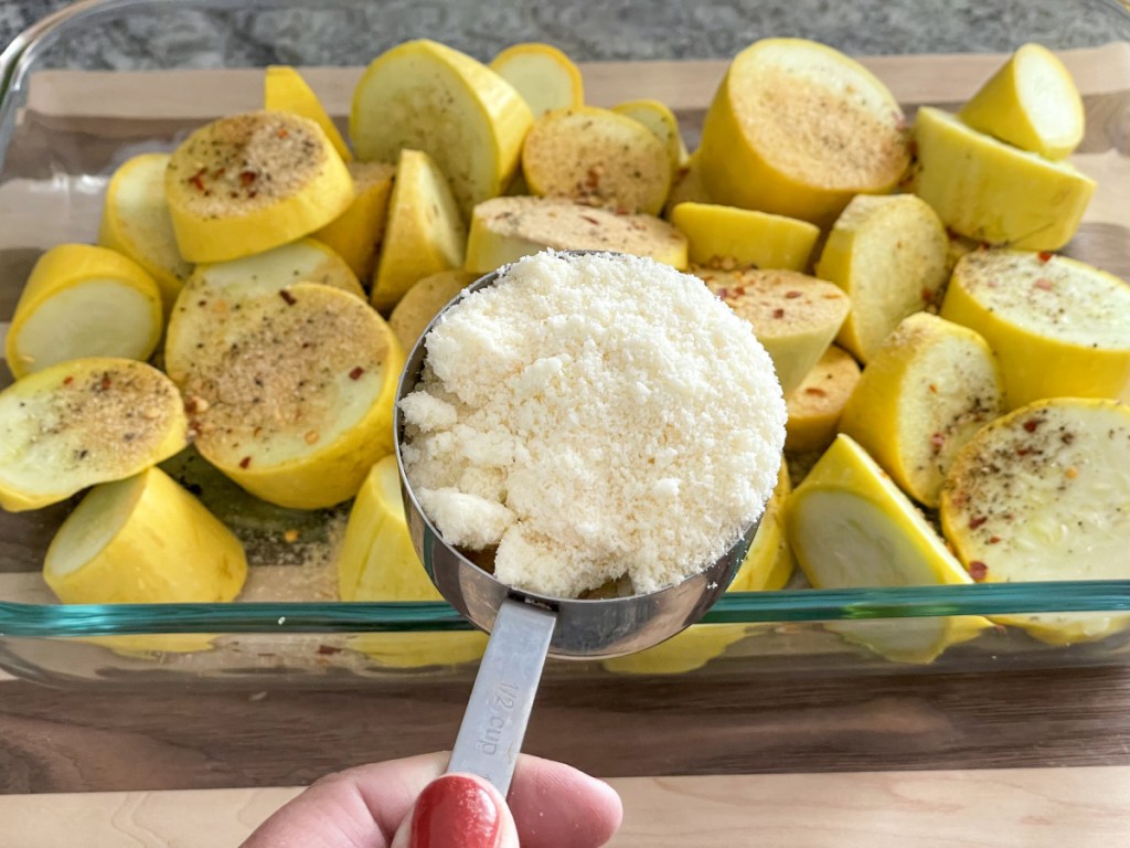 measuring cup of grated parmesan 