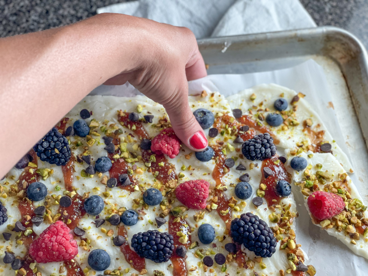 Keto Frozen Greek Yogurt Bark w/ Berries, Pistachios, & Chocolate Chips