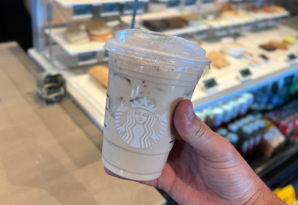 hand holding a keto horchata drink from starbucks