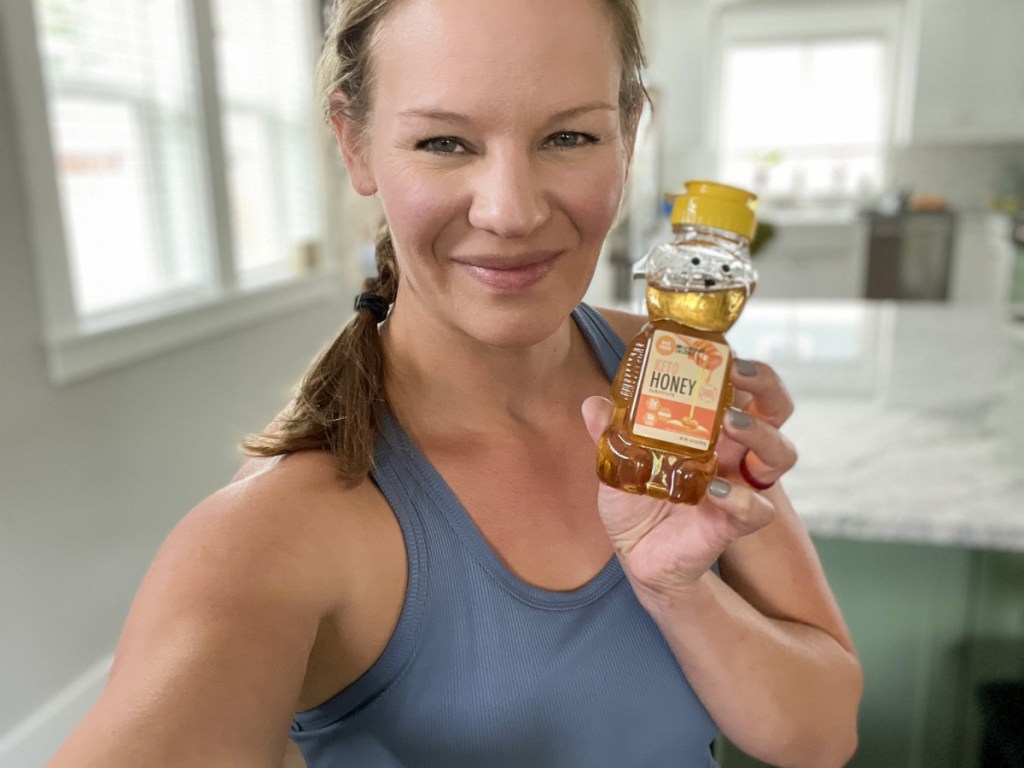 woman holding keto honey 