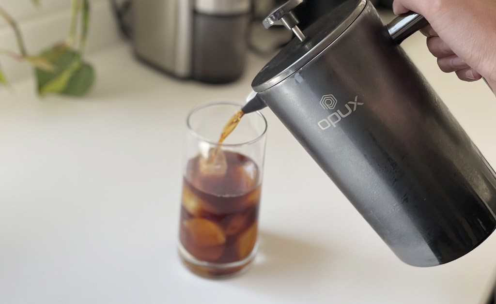 pouring french press cold brew coffee