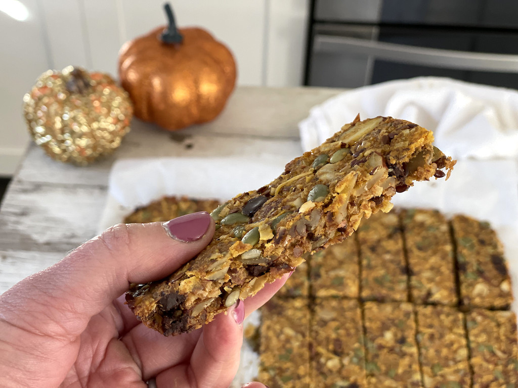 holding keto pumpkin chocolate chip bars 