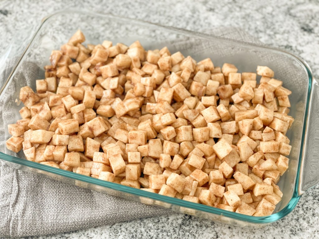 jicama with apple pie seasonings in a baking dish