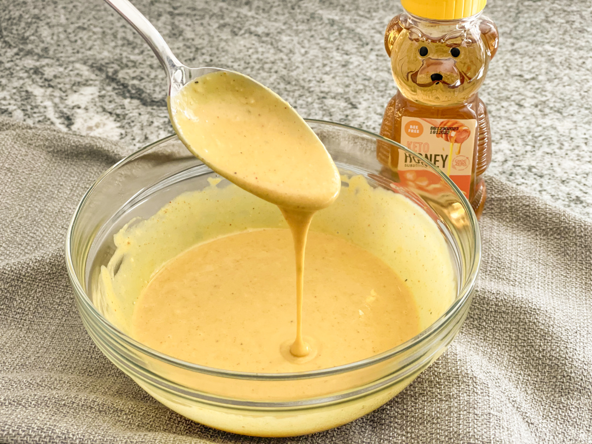 spoonful of keto honey mustard sauce