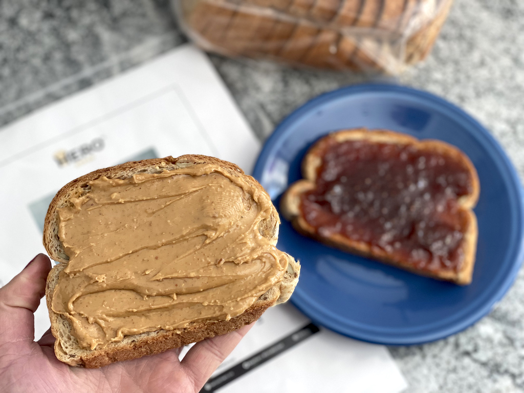 peanut butter on Hero seeded bread slice 