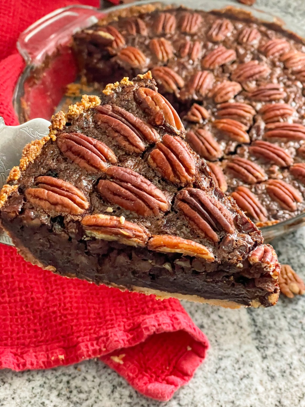 slice of keto chocolate fudge pecan pie