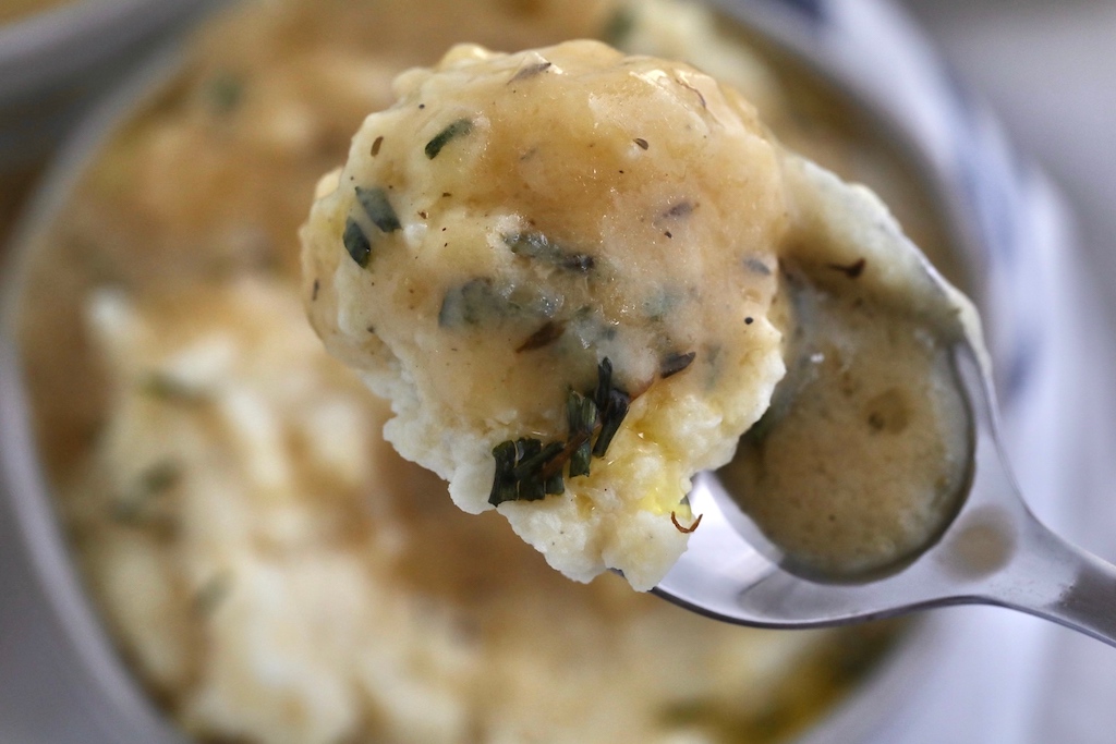 keto mashed potatoes with gravy on spoon