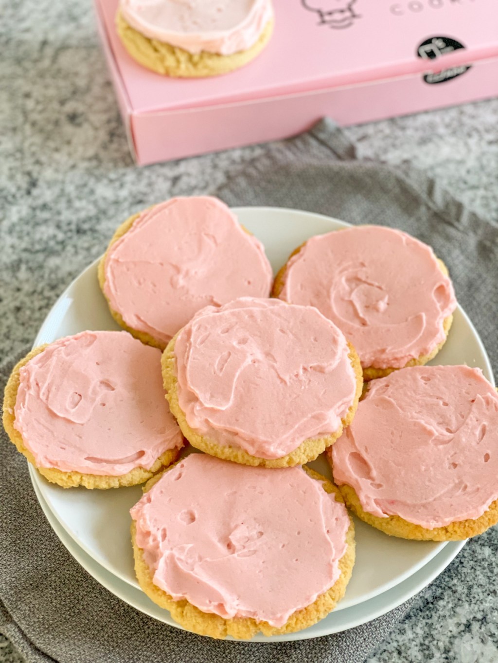 plate of keto crumbl pink sugar cookie