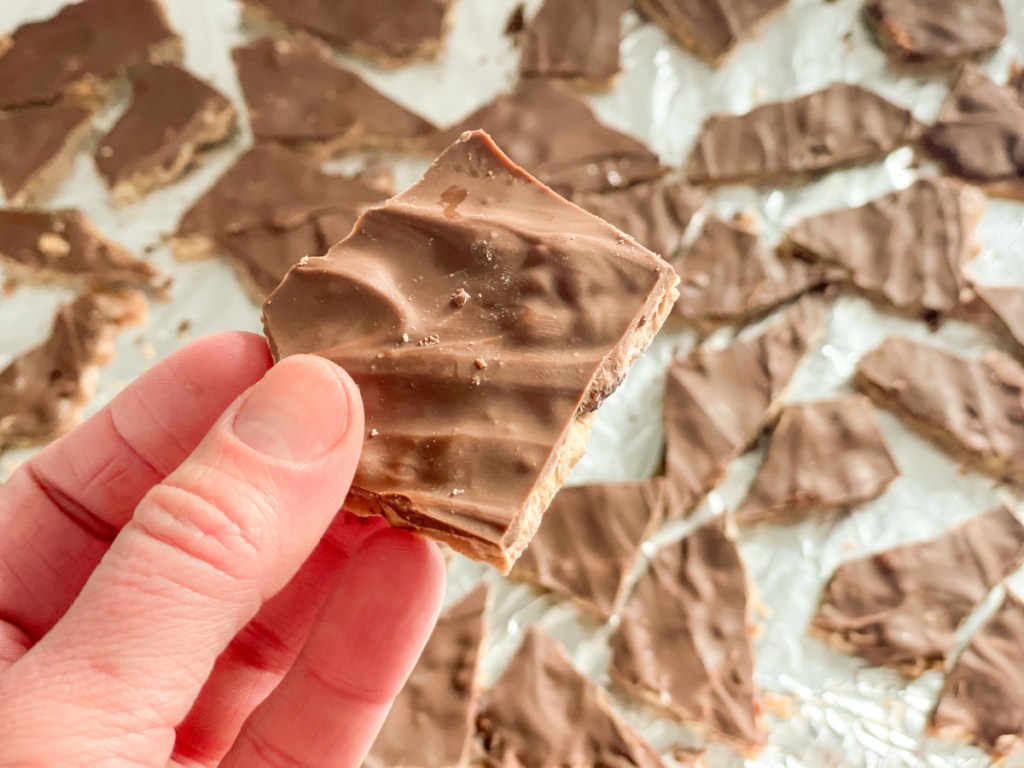 holding a piece of keto Christmas crack