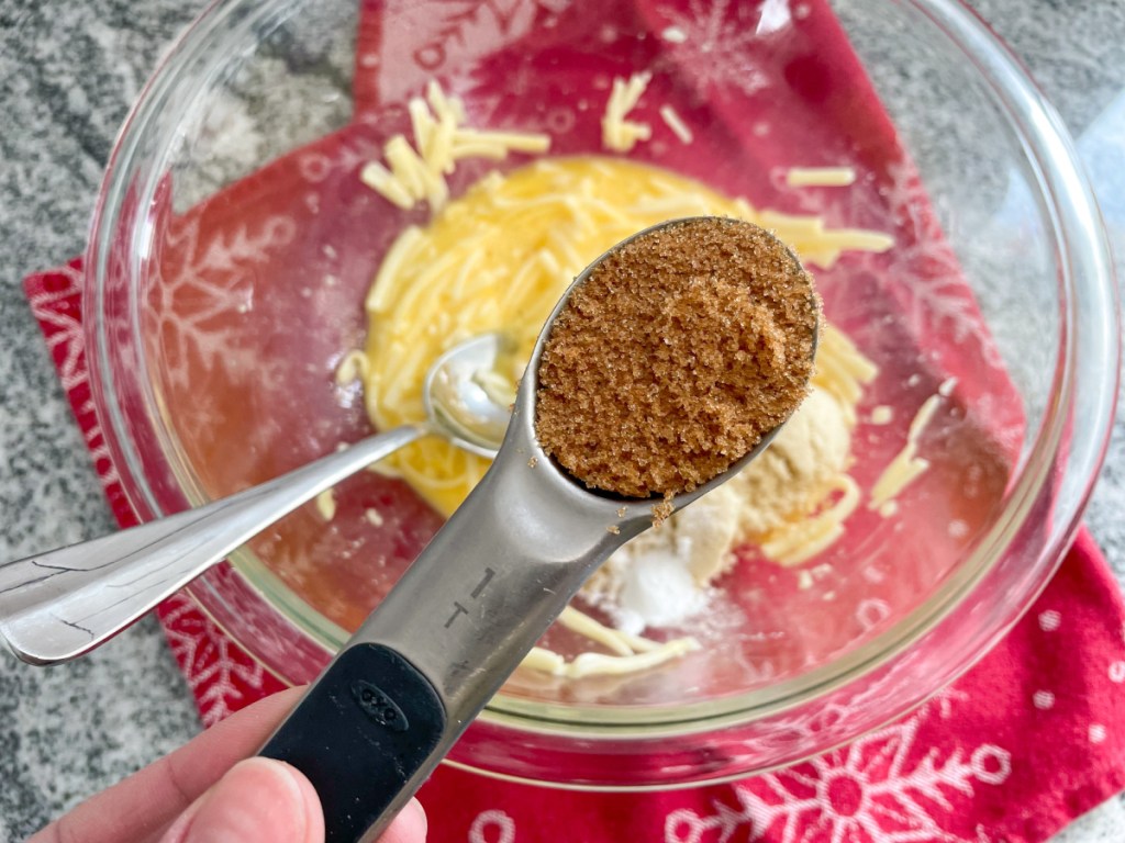 adding keto brown sweetener to egg cheese mixture