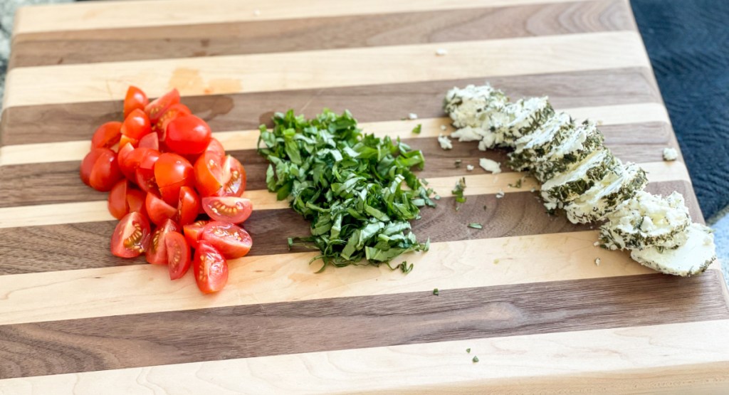 chopped tomatoes, sliced basil, sliced goat cheese