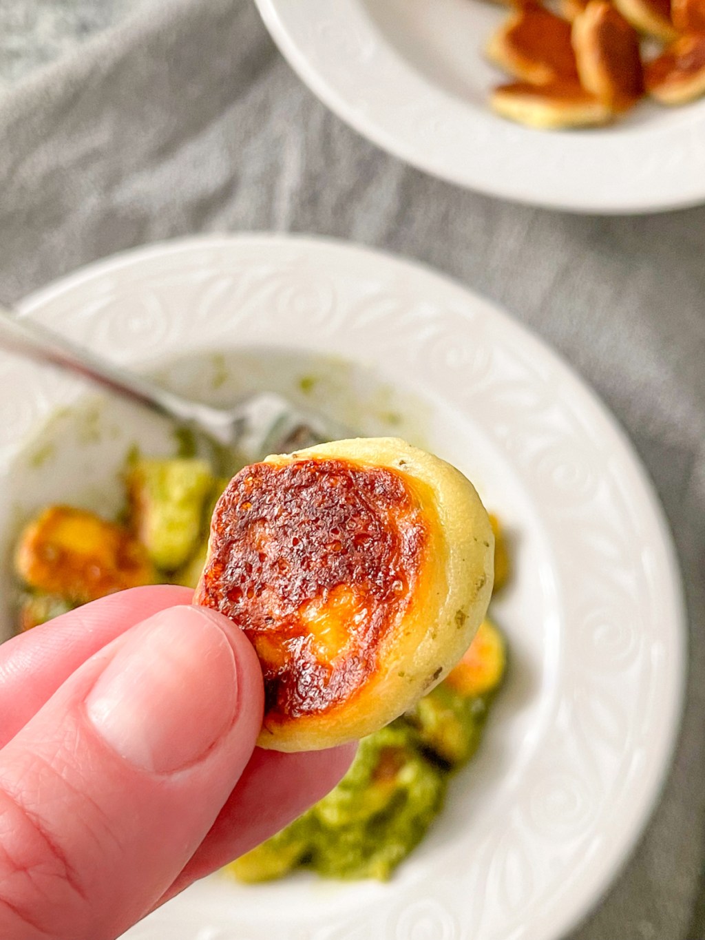 holding a keto gnocchi