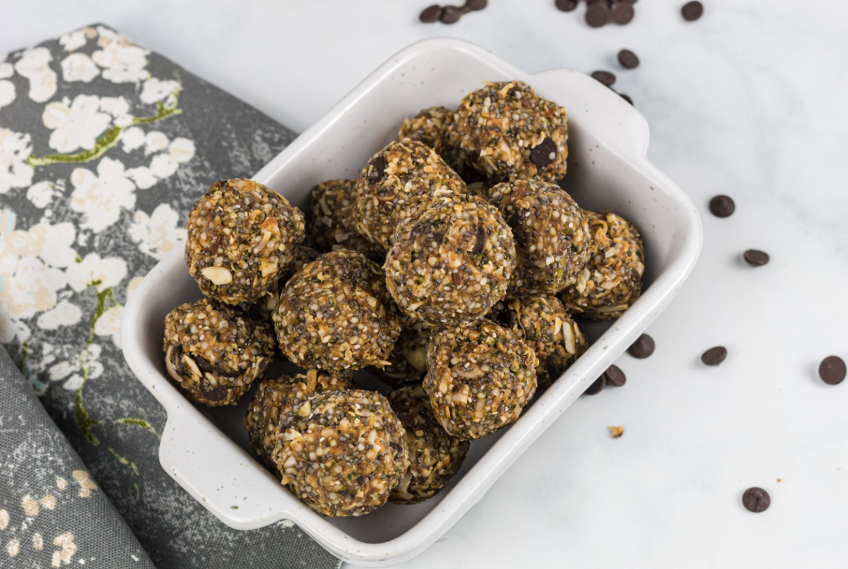 Keto peanut butter protein balls in a white serving dish