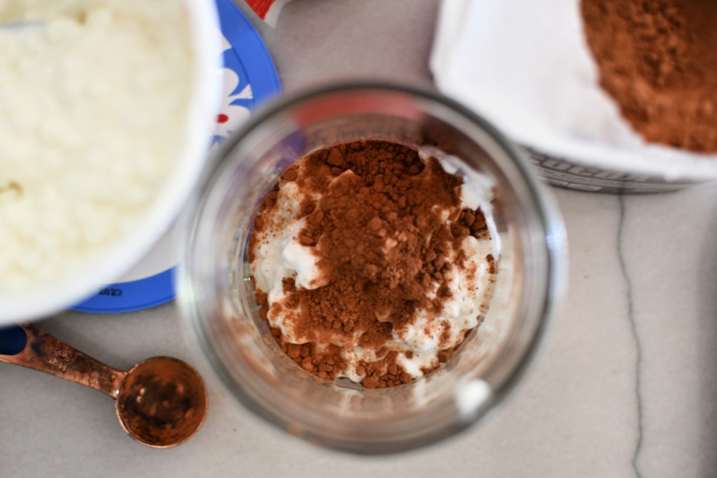 adding cocoa powder to chocolate 