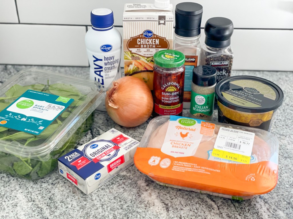 tuscan chicken ingredients on a counter