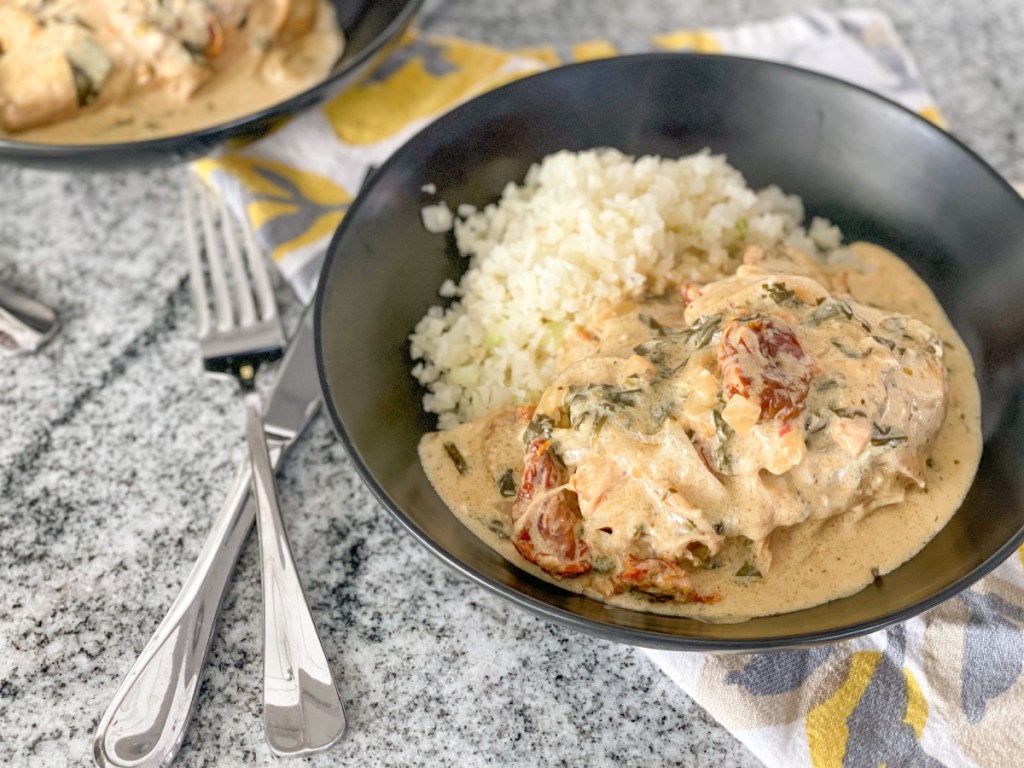 tuscan chicken plated with cauliflower rice