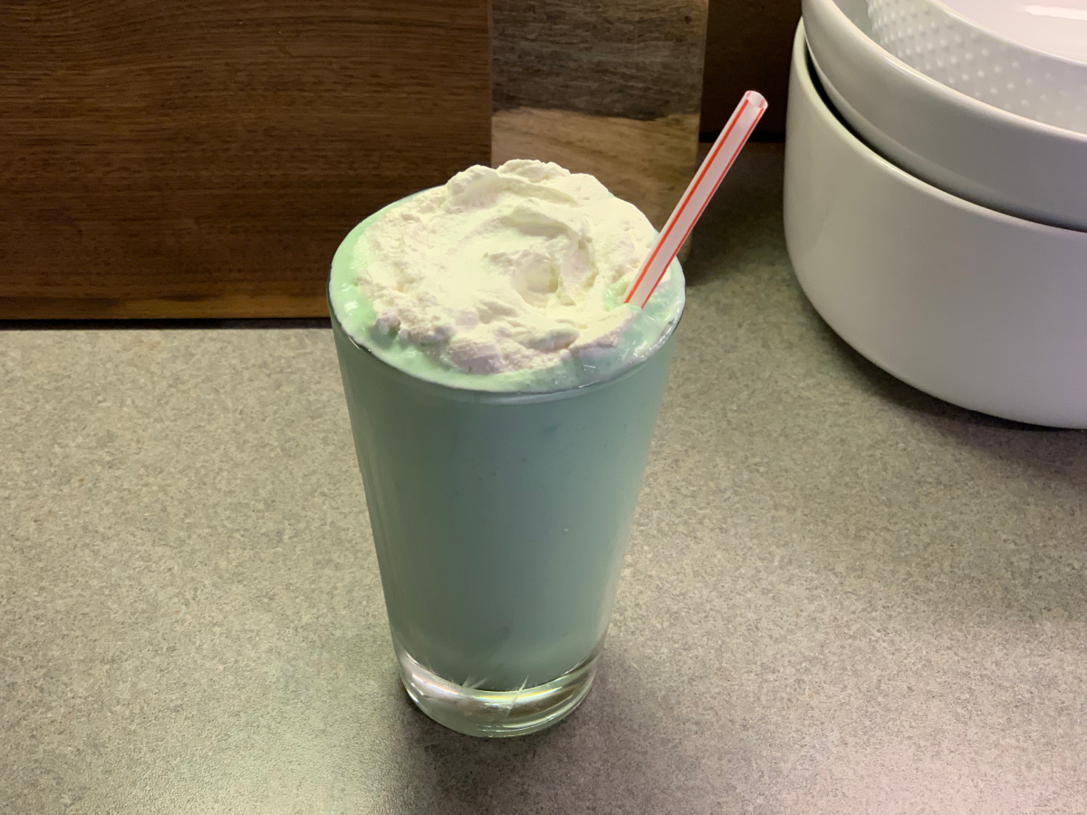 a low carb Keto Shamrock Shake with a straw