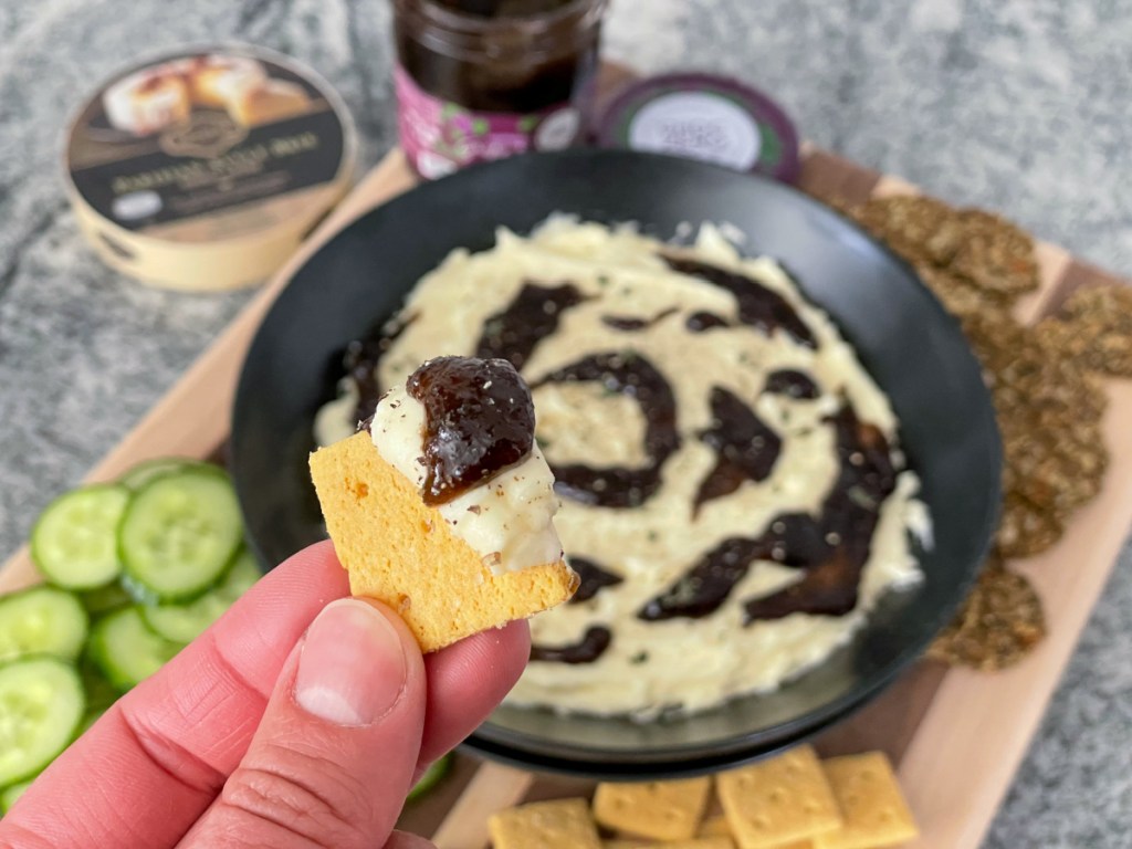 keto cracker dipped in whipped keto brie