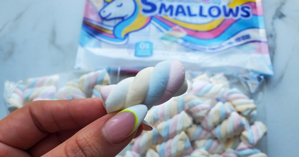 woman holding keto smallows 