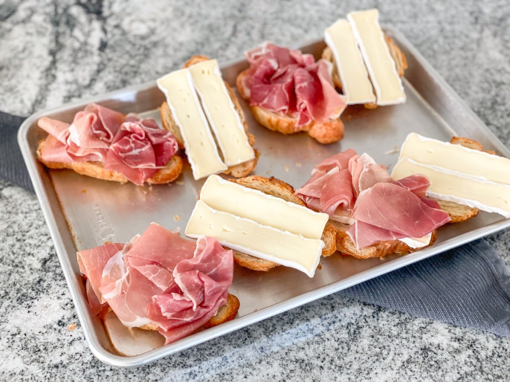 hero bread croissants topped with proscuitto and brie