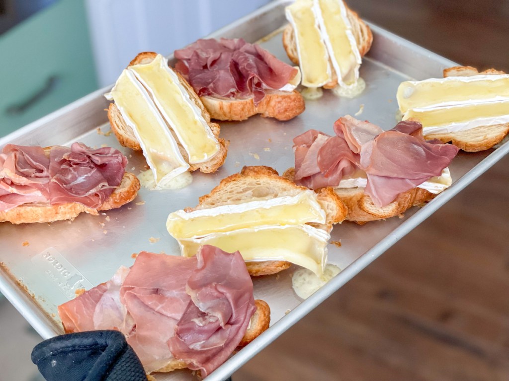 warmed hero bread croissants with proscuitto and melted brie