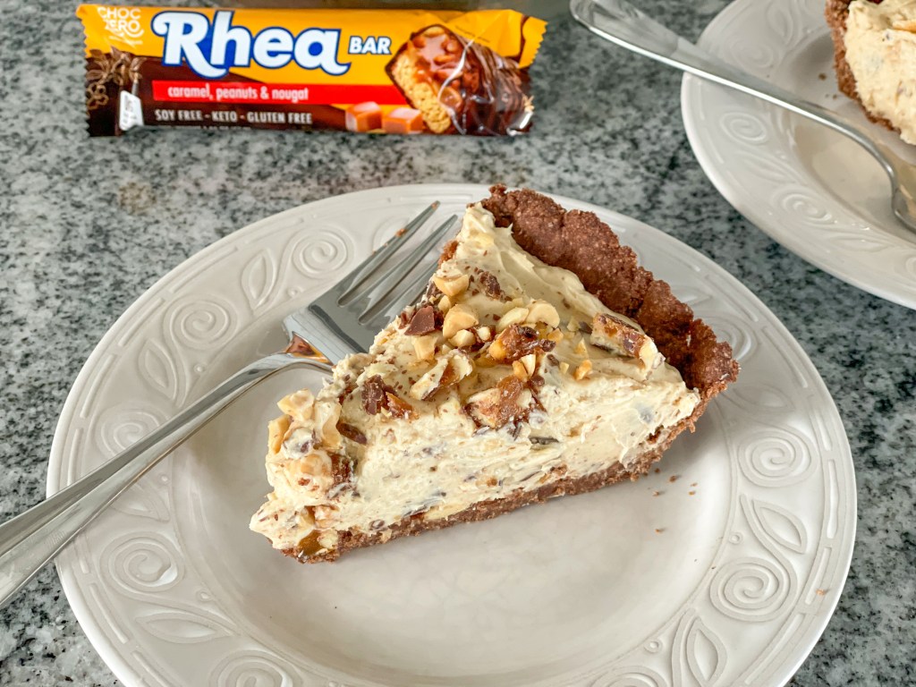 slice of keto snickers pie on a plate