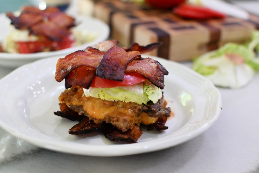 bacon weave cheeseburger on a plate