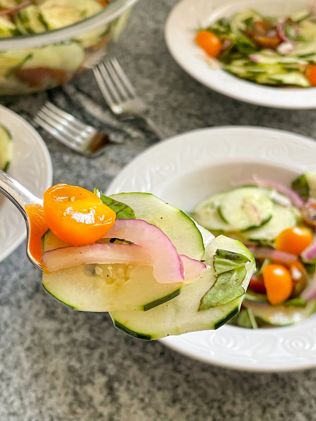 bite of keto cucumber salad on a fork