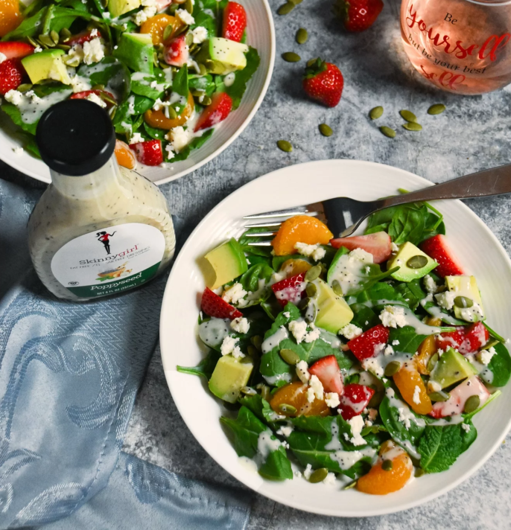 Skinny Girl Poppyseed Dressing is one of the best keto salad dressings and its shown here on a crisp summer salad