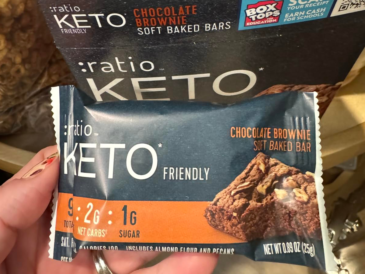 holding a packaged keto brownie