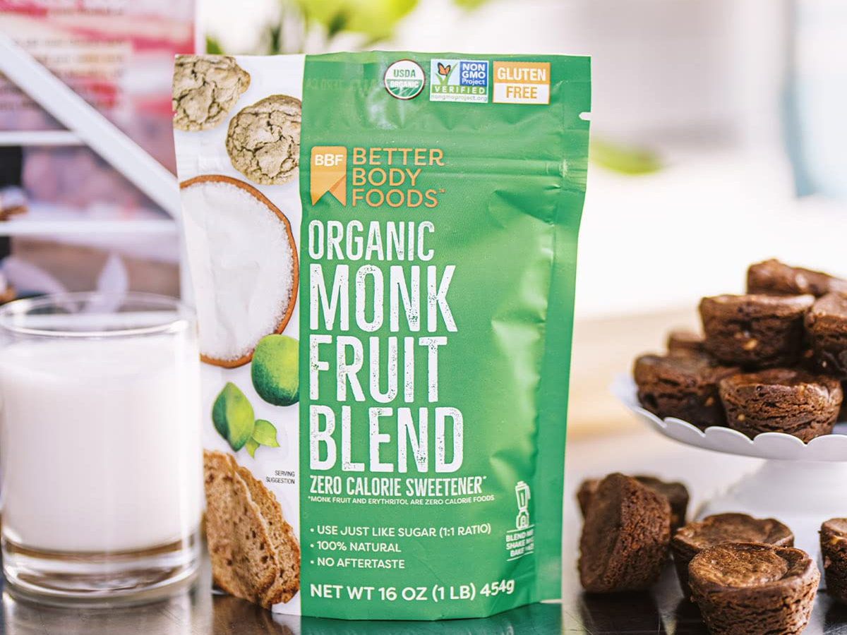 green bag of monk fruit next to brownies and milk