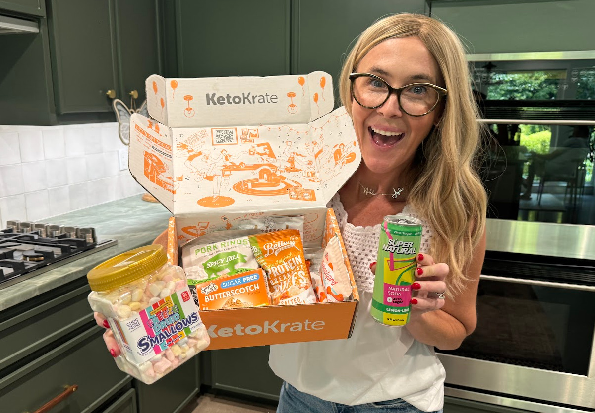 woman holding keto krate box for july 2024