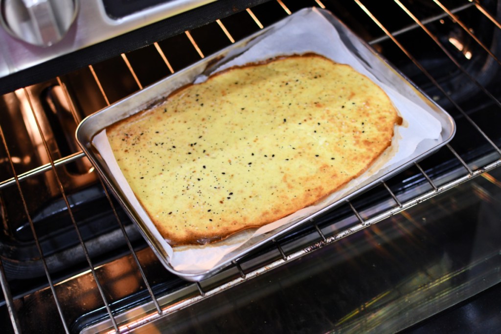 keto cottage cheese and egg flatbread baking in the oven