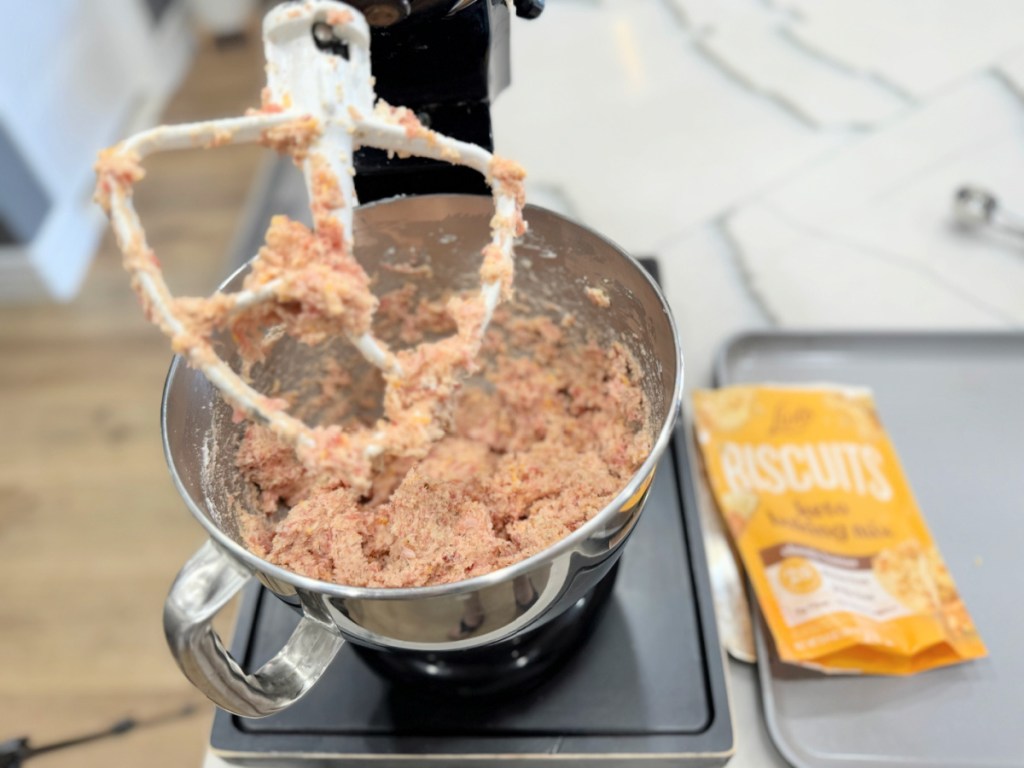 kitchen aid mixer with sausage and biscuit mix inside 