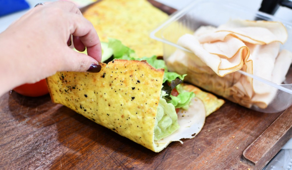 making a sandwich with a flatbread