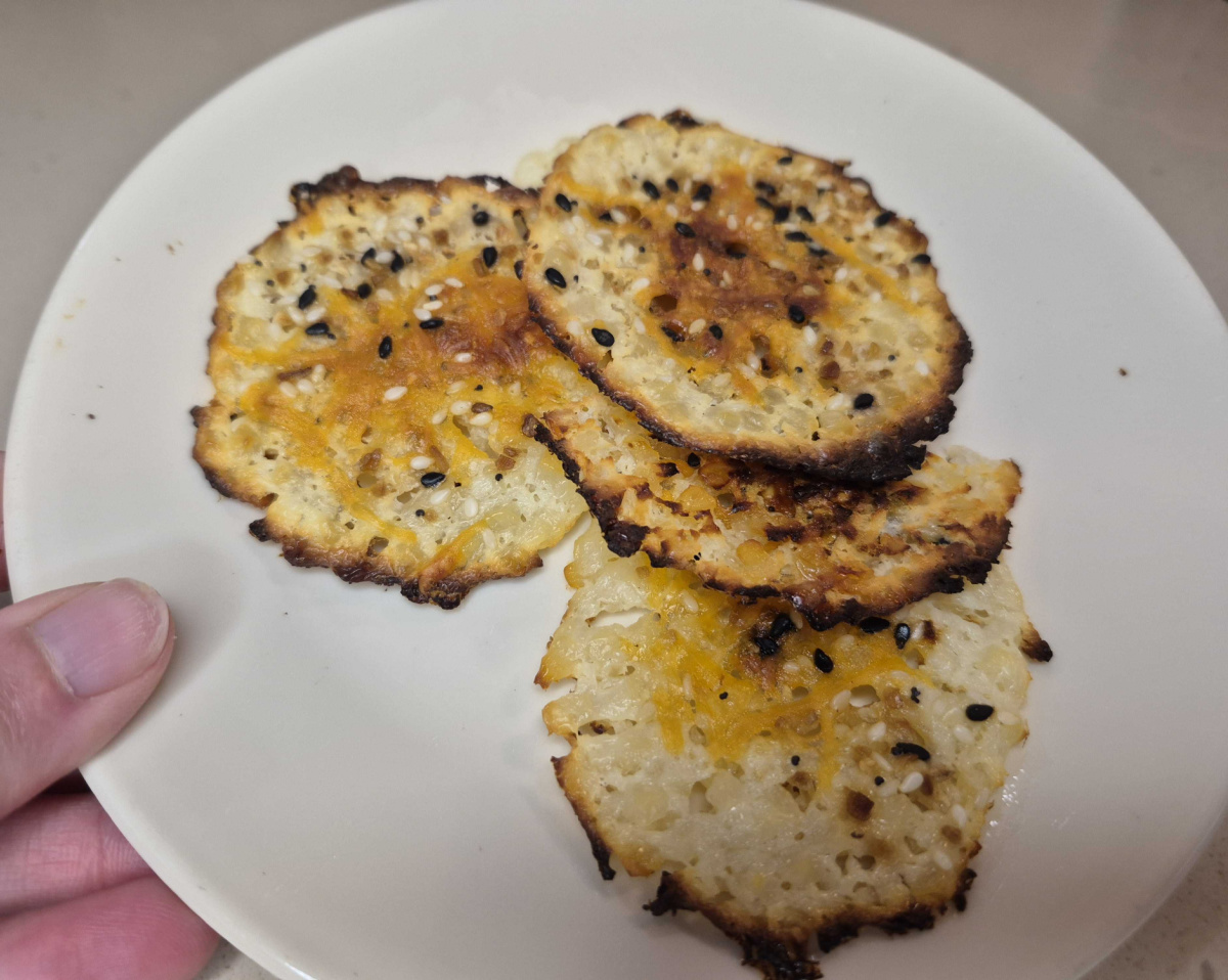 A plate full of baked cottage cheese chips