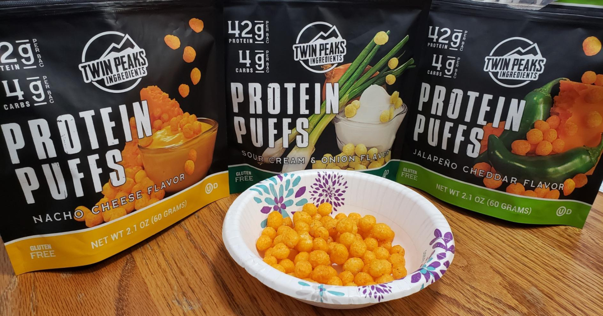 bowl of protein puffs next to 3 bags